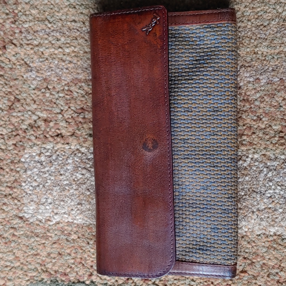 Yves Saint Laurent bi fold wallet.